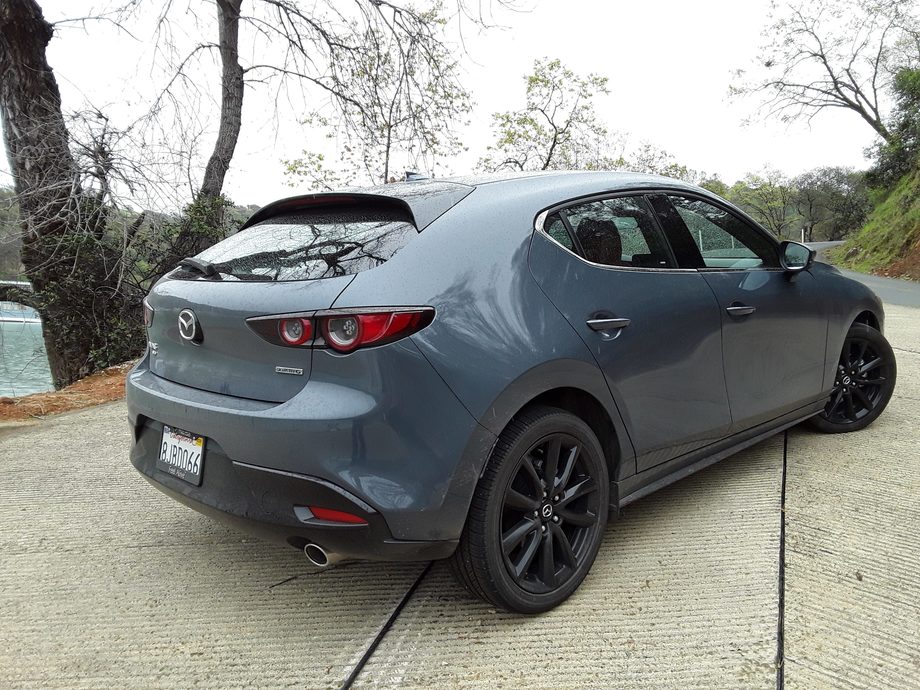 Mazda 3 Hatchback Photos and Specs. Photo Mazda 3 Hatchback exterior