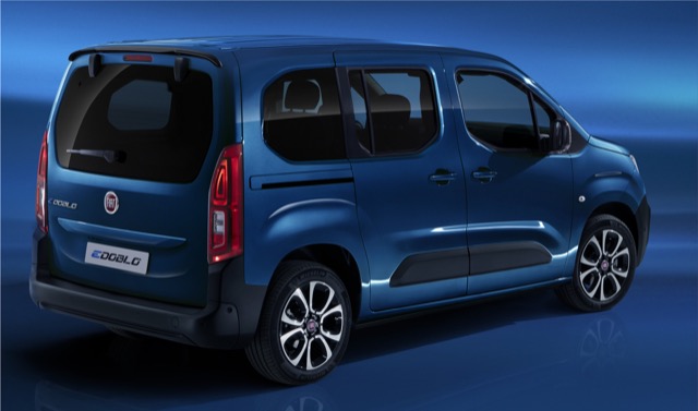Blue 2022 Fiat E-Doblo minivan showing the rear three-quarter profile in a studio setting