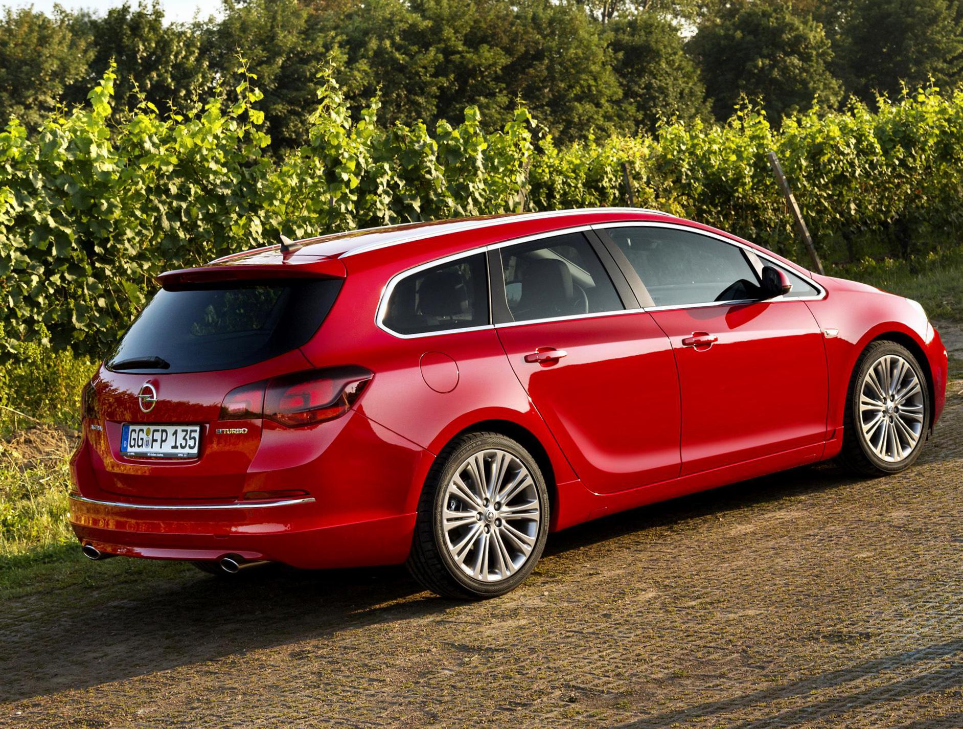 Opel Astra J Sports Tourer Photos and Specs. Photo Opel Astra J Sports